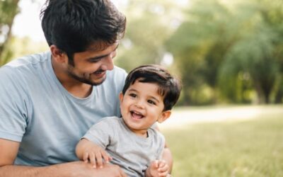 Father playing with his baby boy in Al Quoz Pond Park