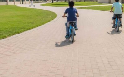 Kids cycling in Al Uraibi Park