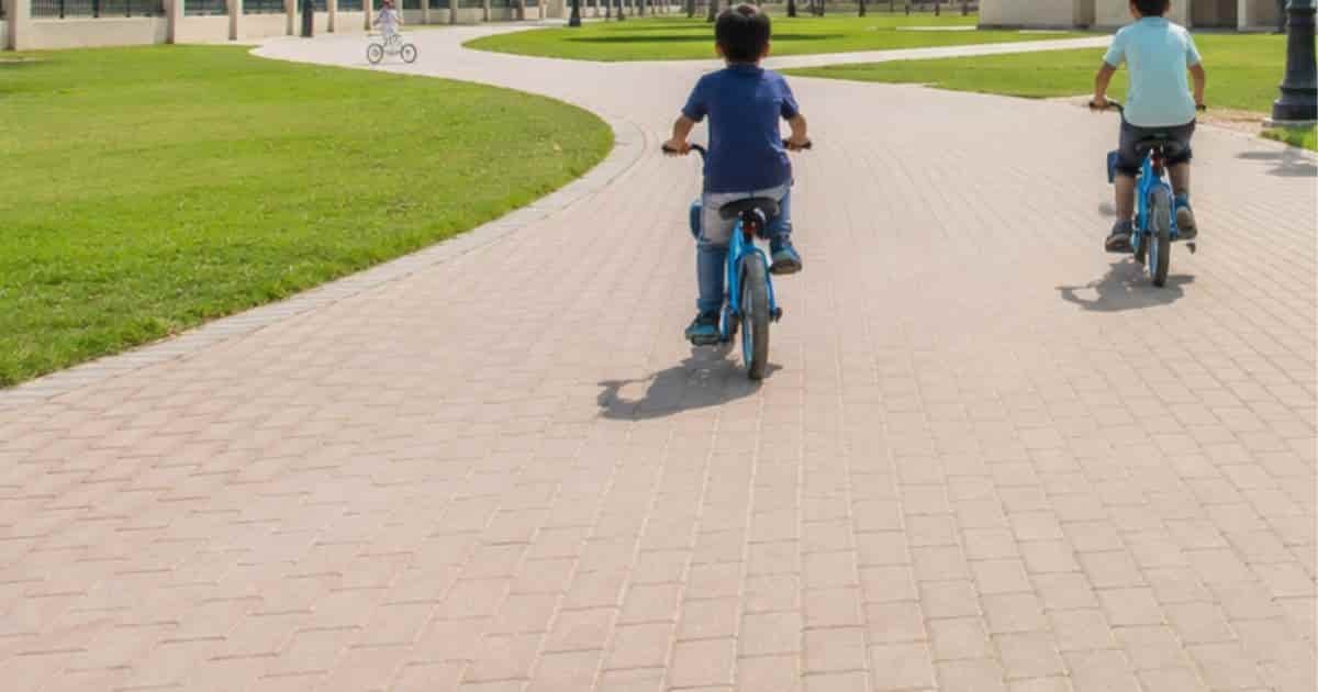 Kids cycling in Al Uraibi Park