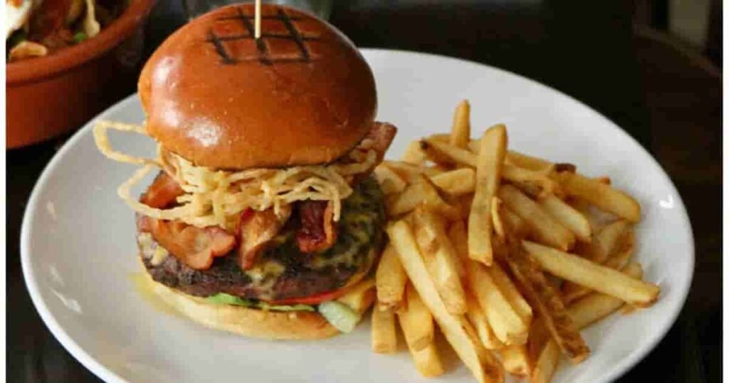Burger with fries at restaurant